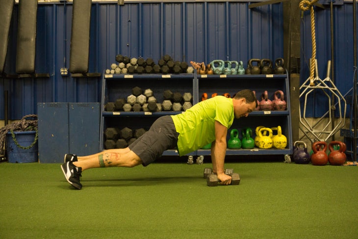"Forrest Jillson performs Scotty Bob, plank dumbbell row"