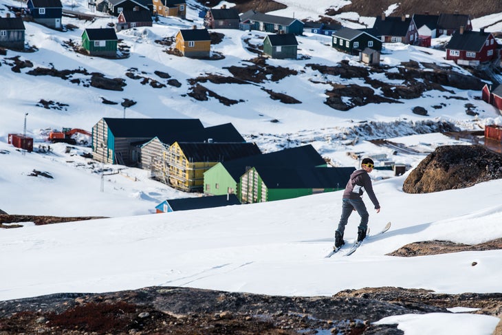 SKG1216_PHO5_Greenland A young boy in too-big boots takes a “hot lap” on the rope tow above the town of Tasiilaq. “It took him about 30 minutes to get down,” Long says,…