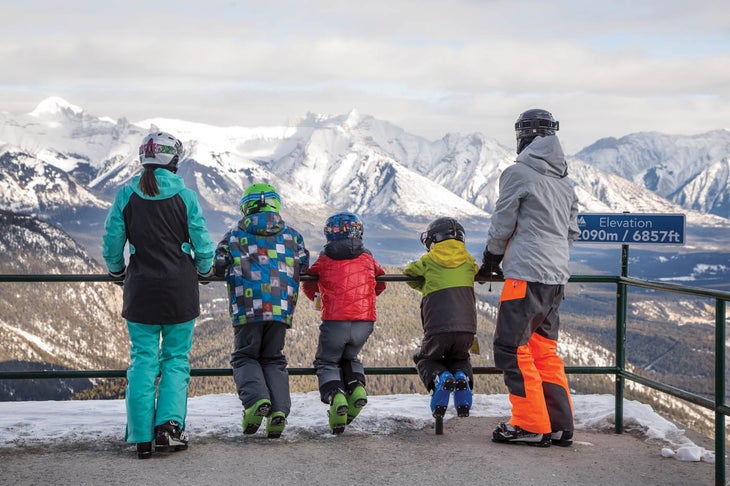 SKI0118_TRA4_MountNorquay_CourtesyDanEvans The writer and family appreciate the scenery from the overlook at Mount Norquay's Cliffhouse, at 7,000 feet over the town of Banff