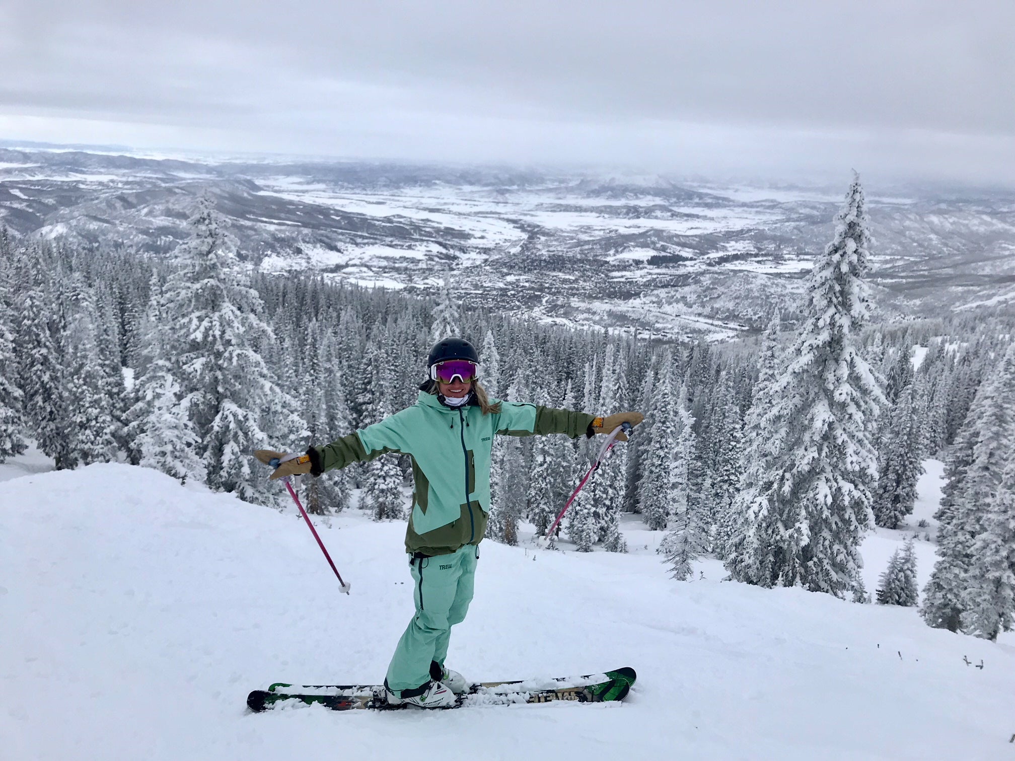 "Jessi skiing in TREW Chariot Bibs"