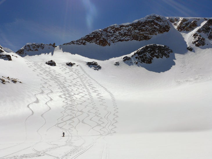 SKI0218_UTL4 Making tracks on the Grasshopper Glacier under Iceberg Peak