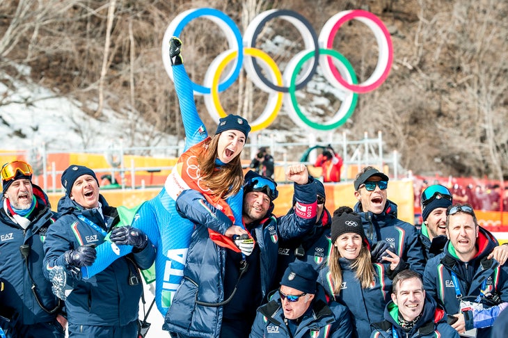sofia-goggia-celebrate-w-downhill-crystal-sagan Sofia Goggia and the Italian coaching team celebrate in PyeongChang, South Korea