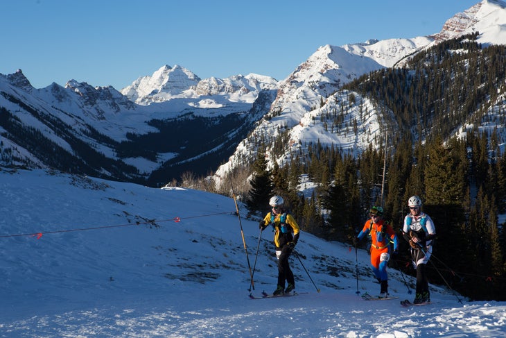Po4_skiersJonJTJ_AspenSnowmass_jeremyswanson The author (in white) and his partner overtake another team at the top of the Snowmass climb.