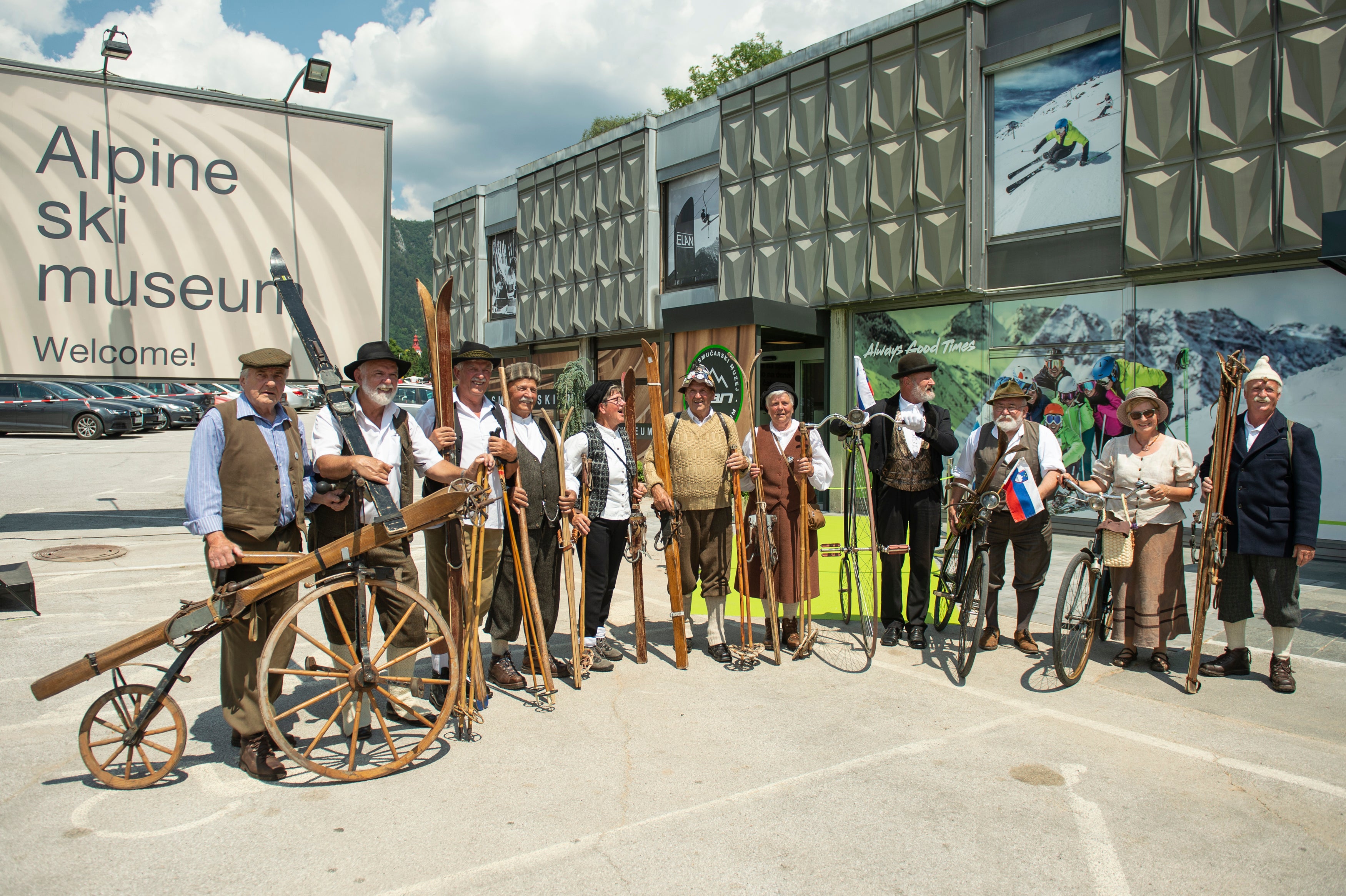 "Slovenians in old-style dress show off vintage Elan ski gear on opening day."