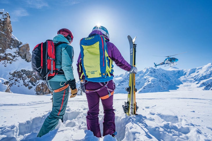 SKI1218-Tordrillo02-byCamMcLeod-s Jess McMillan and Forrest Jillson scout Capps Glacier for their next line.