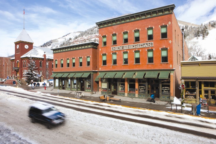 NSH Winter across st New Sheridan Hotel, Telluride; Winter's Best Road Trips 2019