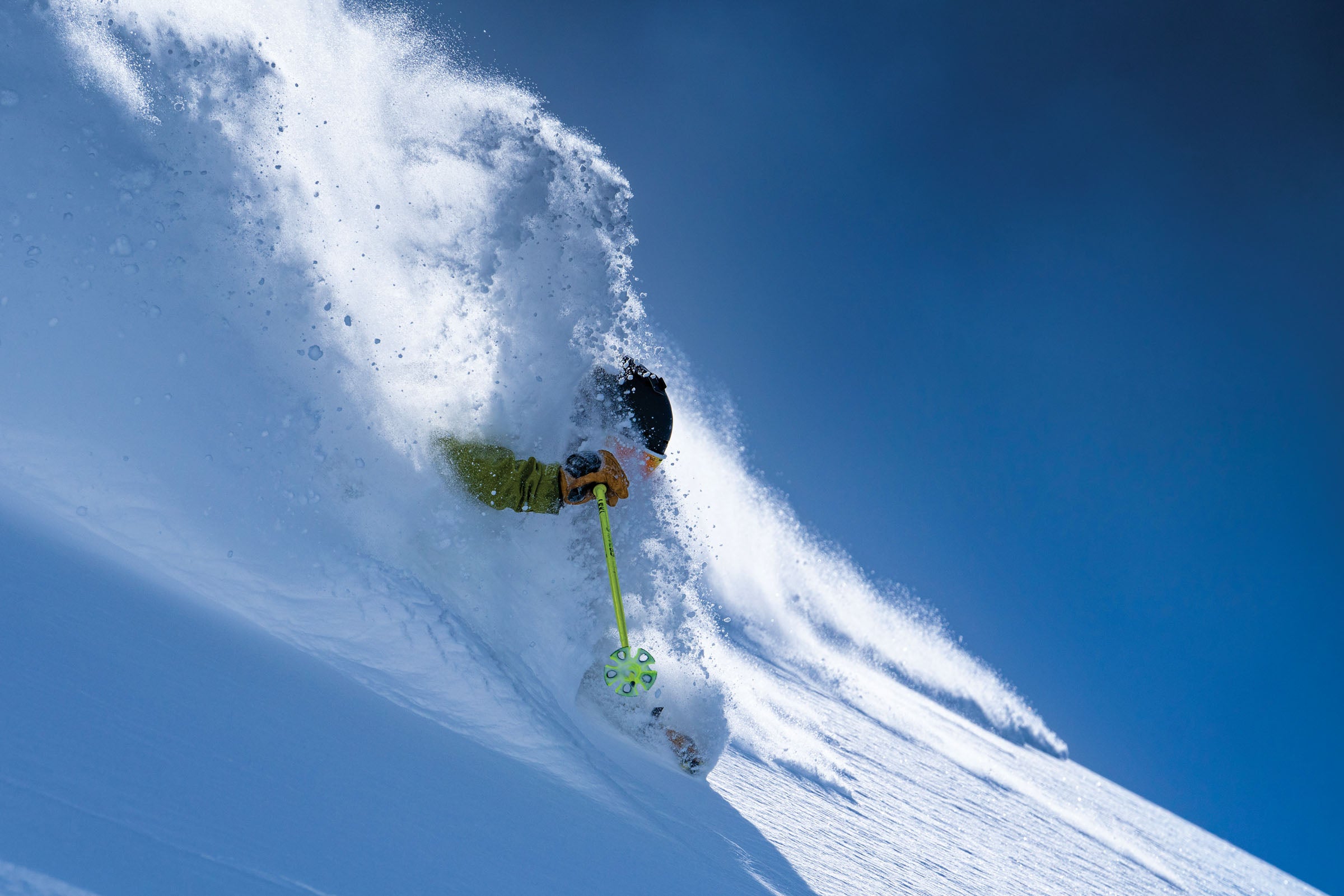 "Marcus Caston skiing powder during a hell-ski excursion on the French-Swiss Border."