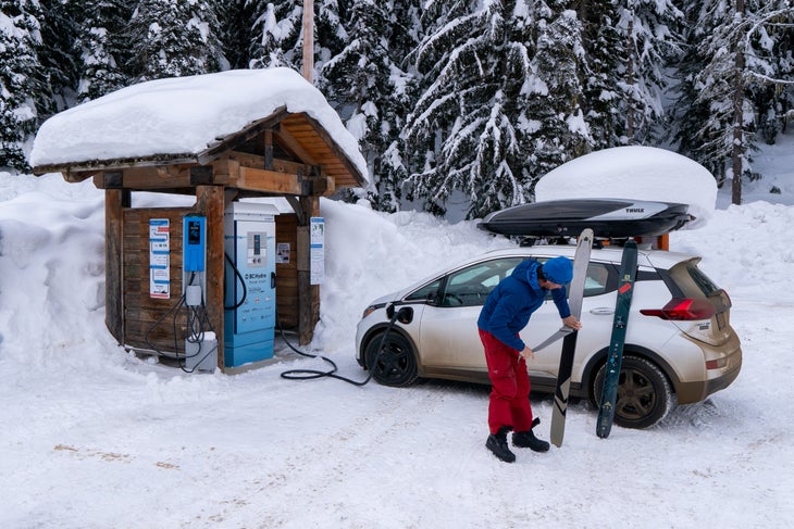 Rogers Pass_Travis Rousseau Greg Hill charges his electric car on Rogers Pass.