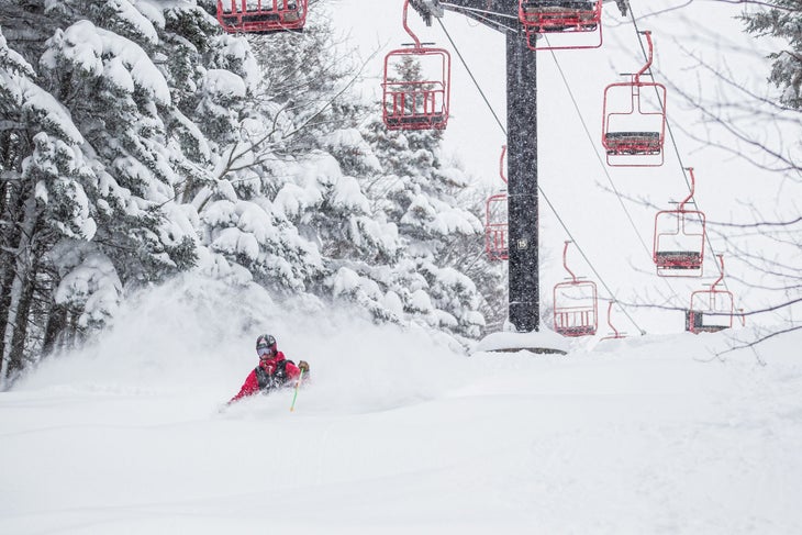 SKI1018-TRA1-MagicMtn-byJustinCash Chest deep and loving it beneath Magic Mountain's iconic Red Chair
