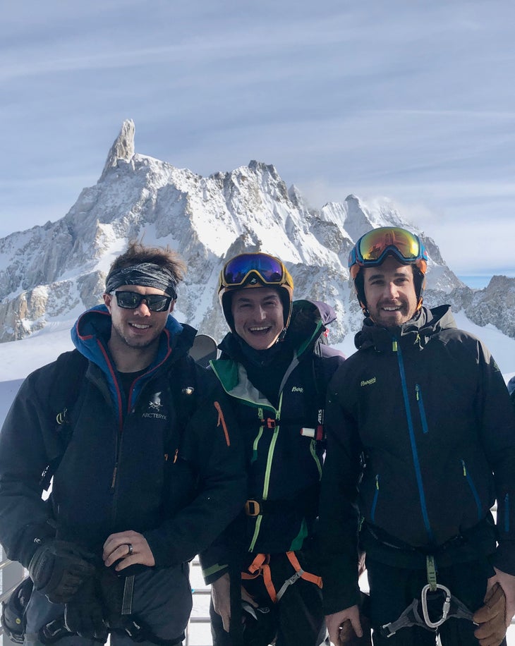 NEW 4FRNT OWNERS Charlie, Ebi, Will in Italy at the top of the Skyway Monte Bianco with Monte Bianco the background before skiing the Valley Noir. New owners of 4frnt in Chamonix