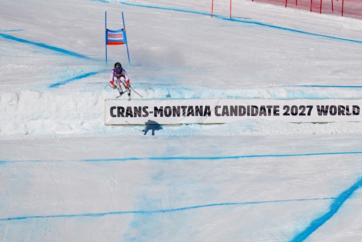 Lara Gut-Behrami is airborne on the final jump of Crans Montana downhill