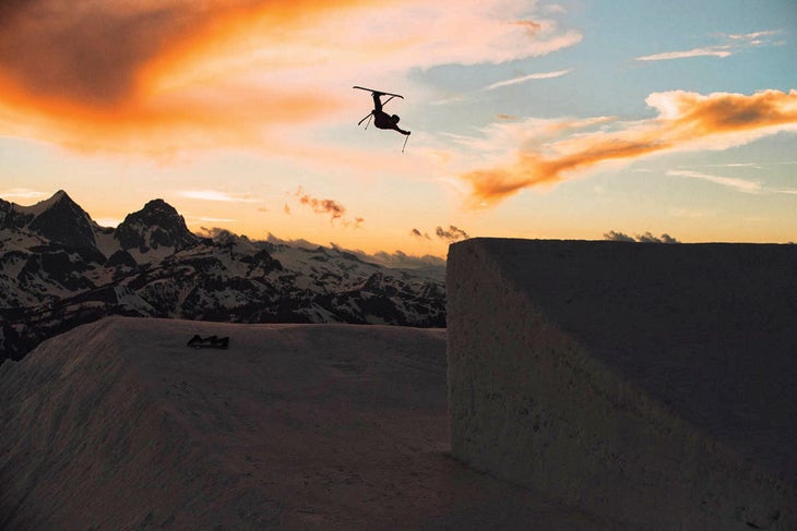 Skier launches off kicker at Mammoth terrain park