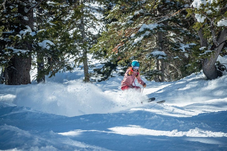 Skier on all-mountain skis in crud