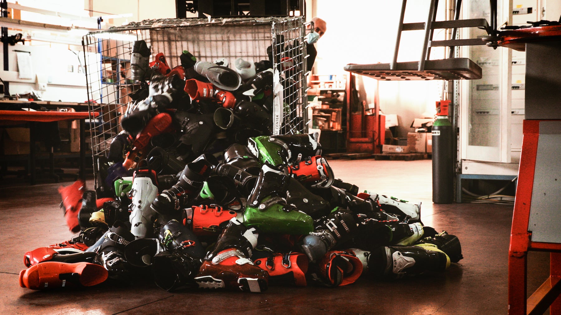 Pile of old ski boots to be recycled
