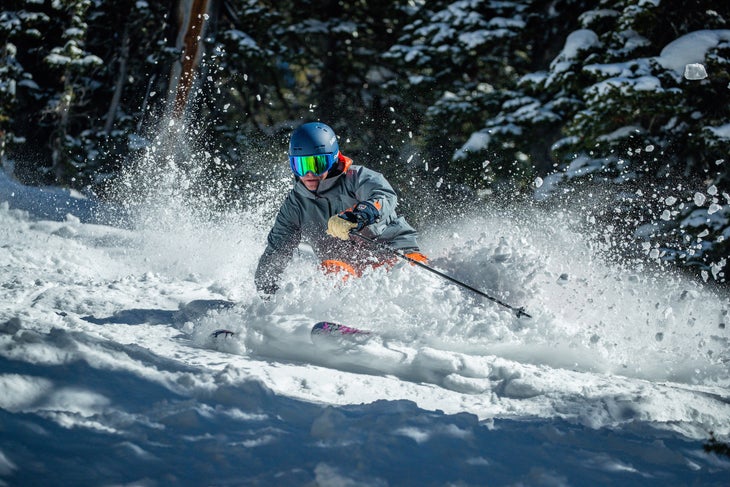 Skier on all-mountain skis in choppy snow