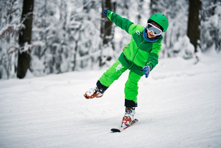 boy skiing on one ski