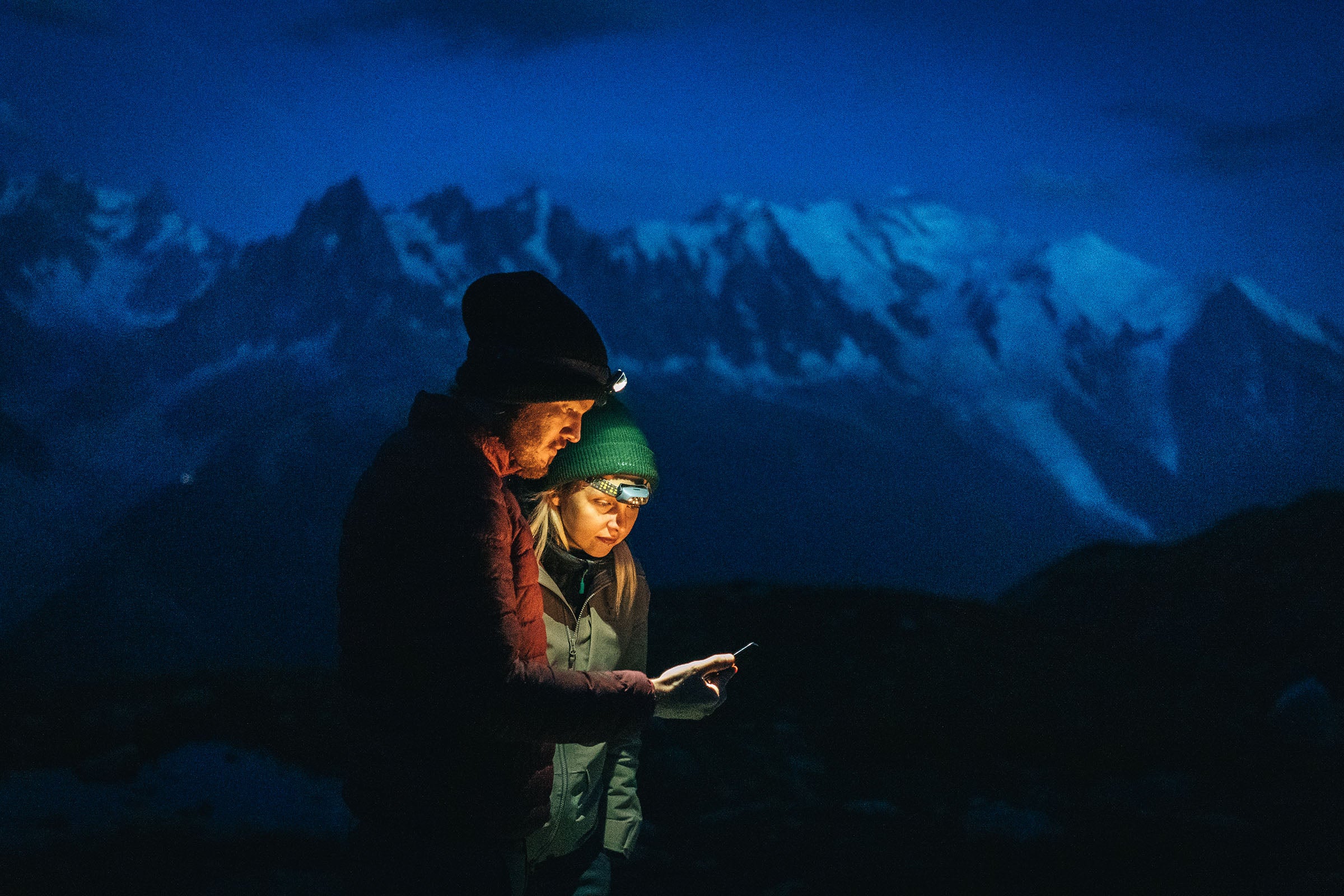 Hikers with headlamps