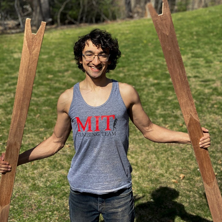 Avilash holding his homemade skis