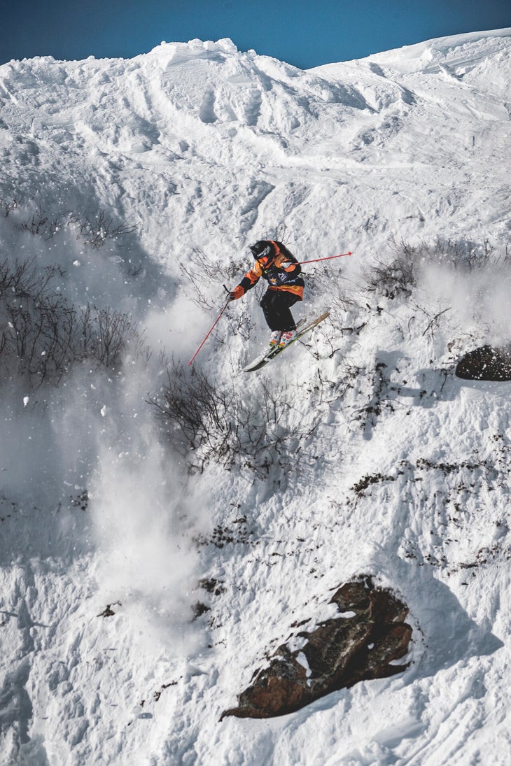FWT athlete Max Palm jumps off a cliff during competition