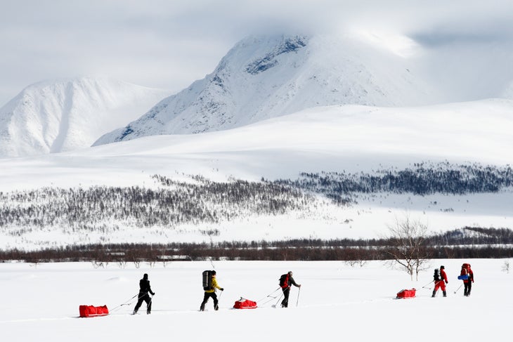 Backcountry ski tour with sleds