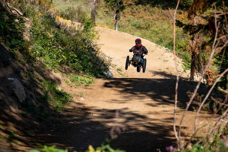 Adaptive rider on JHMR Deepest Darkest bike trail