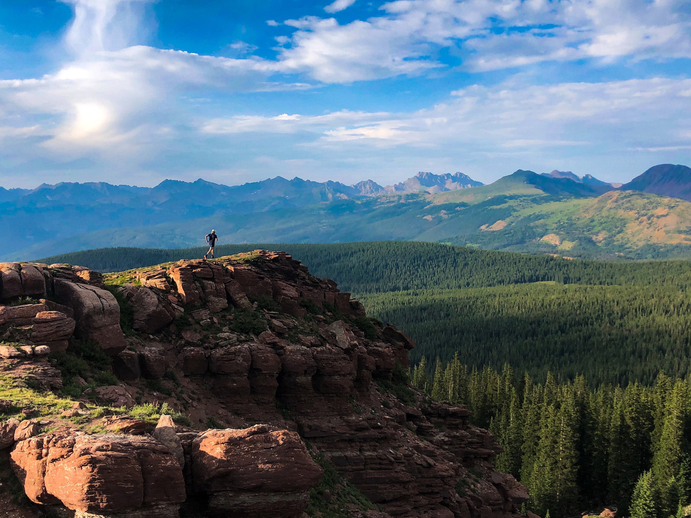 Skier Drew Petersen running at altitude in Colorado
