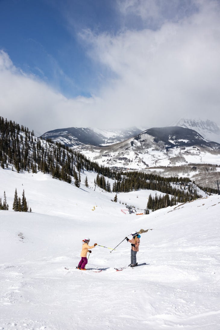 Skiers on slopes of Crested Butte