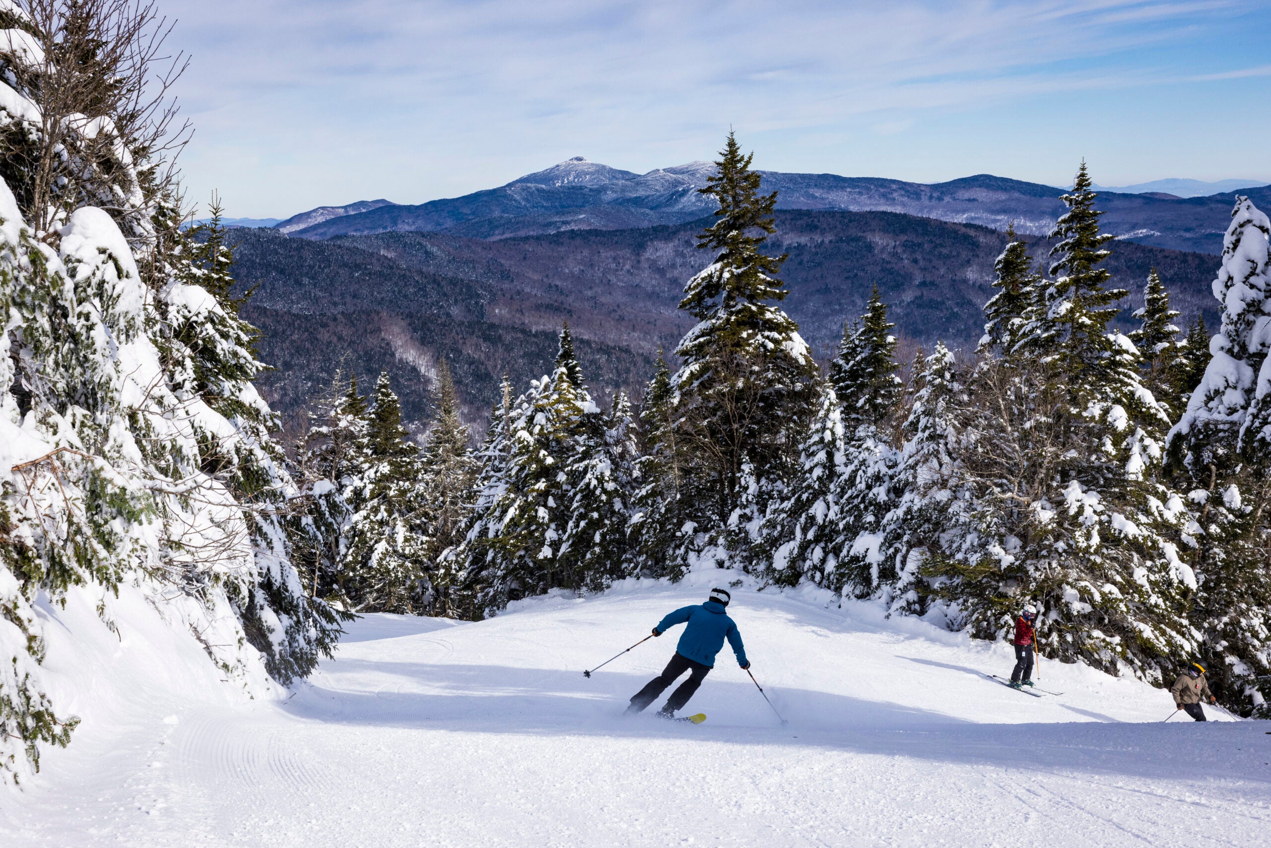 Skier in blue enjoys bluebird day at MRG