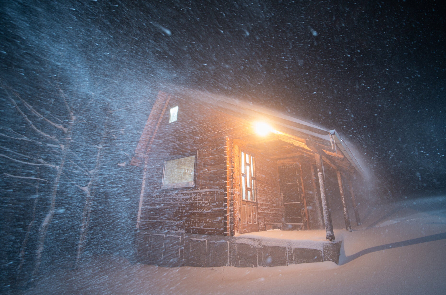 Cabin in the woods during winter