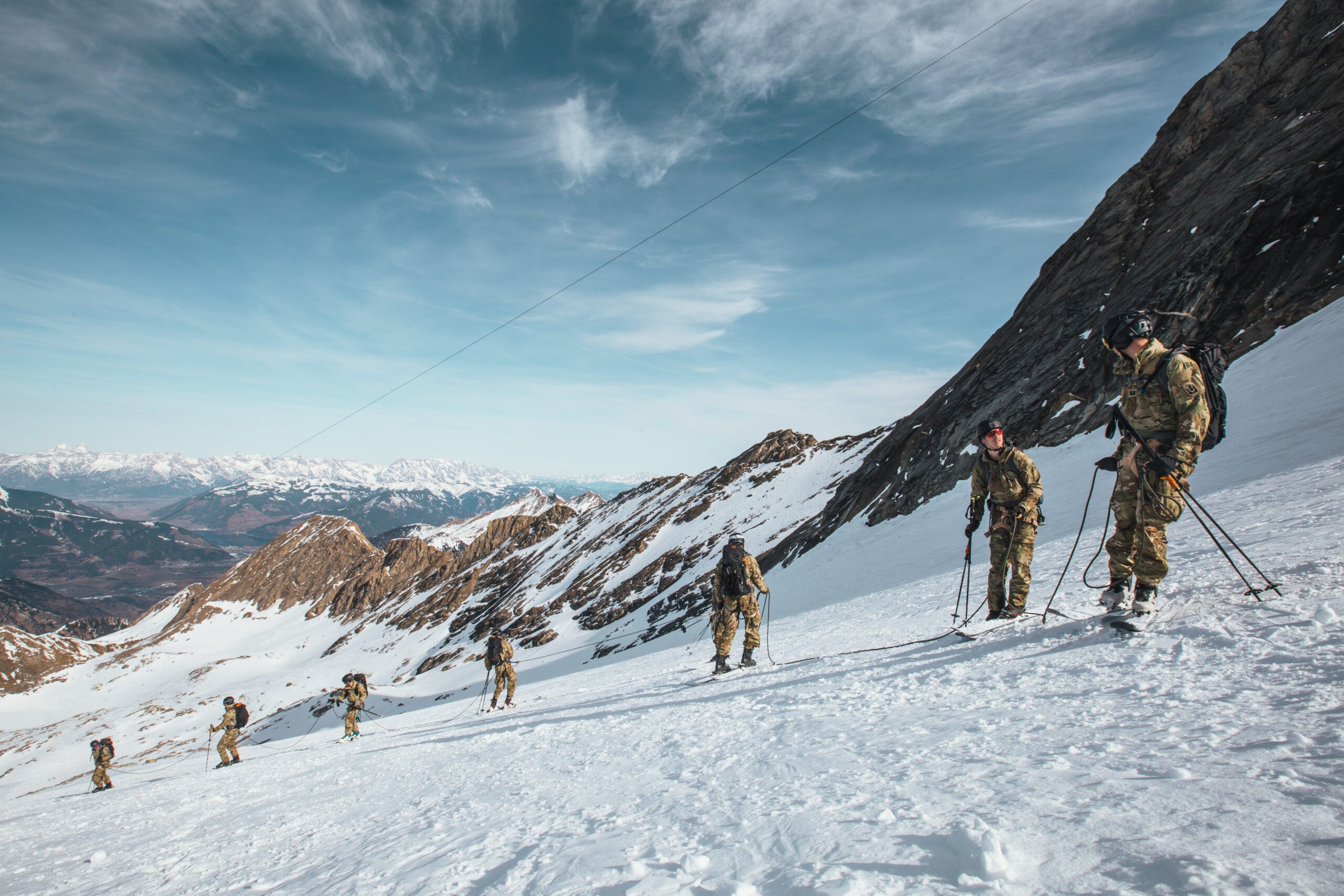 Like Powder 8s but your life depends on it: the Alpha Team practices roped skiing for glacial travel, a gradable aspect of the race.