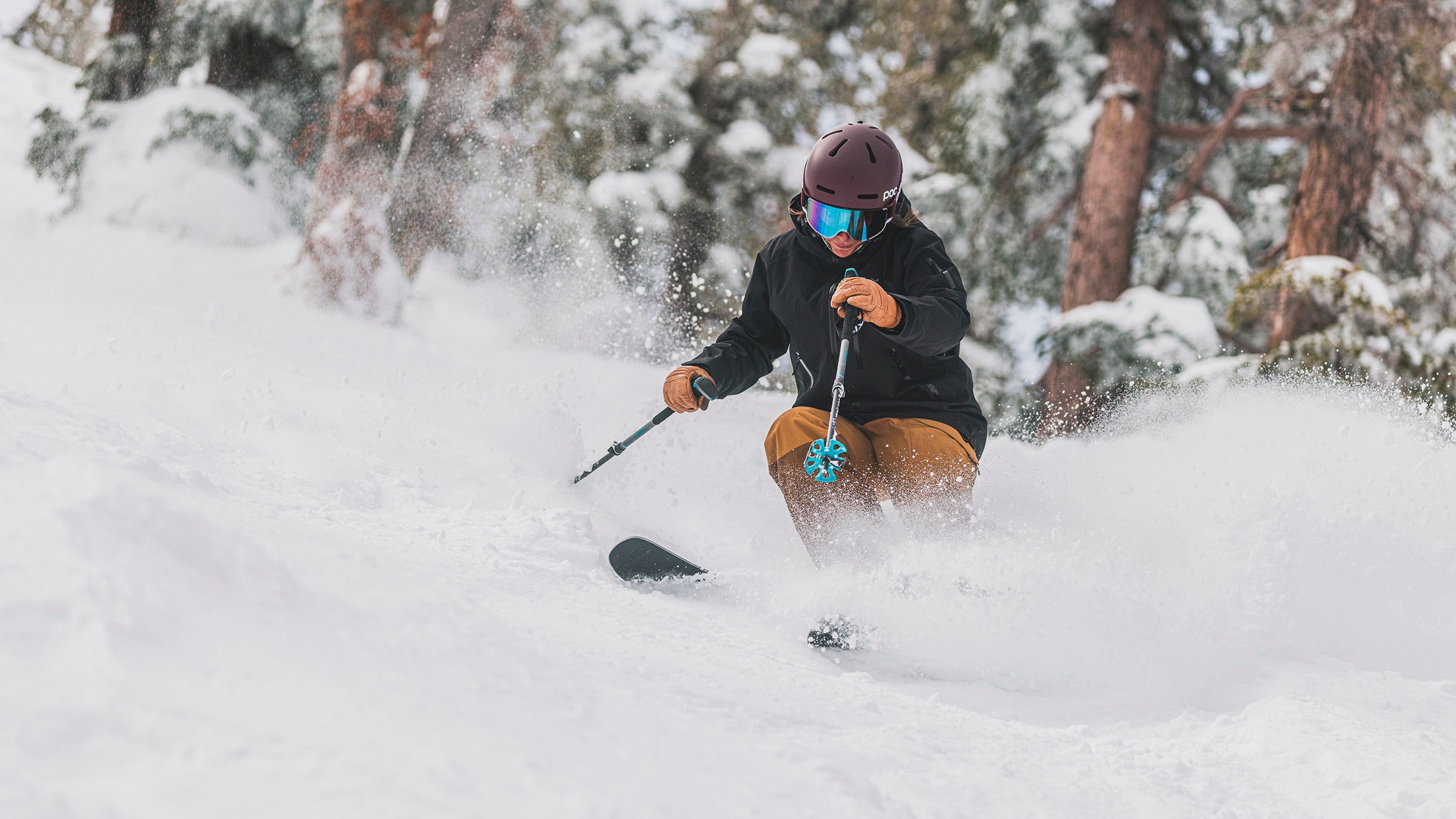 Woman skiing on wide women's skis at SKI Test