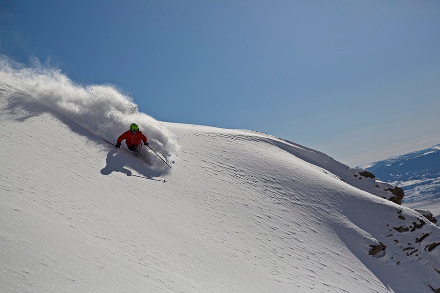 Jackson Hole Jeff Annetts slashes pow near the Headwall area at Jackson Hole Mountain Resort on Tuesday. The resort reported 4 inches on Tuesday, but is now…