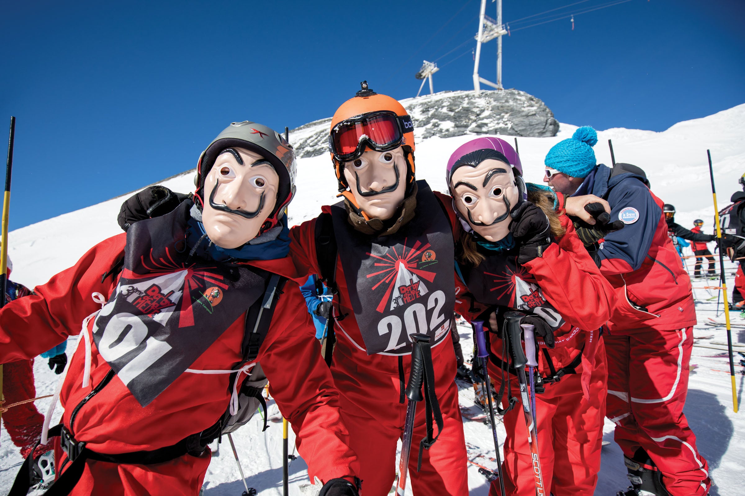 SKI1219-Derby0044-byChristofferSjostrom copy Three skiers wearing Salvador Dali masks at the Derby De La Meije