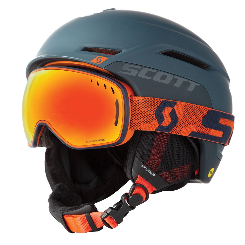Orange goggles with blue-gray ski helmet