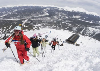 Deboarding A skier deboards the chairlift and starts a much-anticipated run.