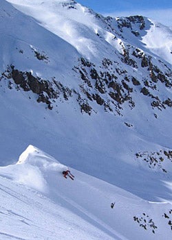 Until This Time Next Year... An empty chair makes its way down the mountain to pick up more skiers and riders for their first runs of the season. As for the battle with neighbor…