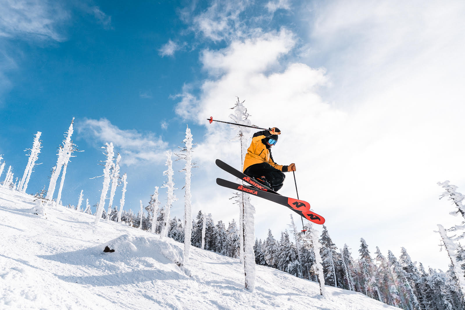 Skier jumping at Saddleback Mountain ski area